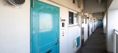 Sumida Ward, Tokyo, Japan-February 19, 2021: Corridor of an old public apartment.